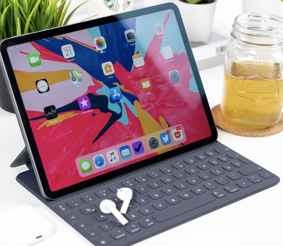 iPad with trackpad, AirPods and other accessories